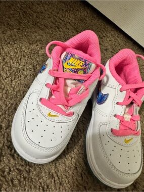 Nike White Sneakers with Pink Laces and Yellow Logo Accents